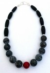 Necklace, black matte agate and red coral