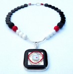 Necklace with sterling silver, onyx, coral, and fused-glass pendant