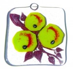 Glass art decoration with green apples
