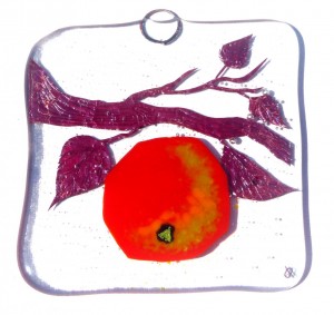 Glass art decoration with red apple