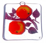 Glass art decoration with red apples