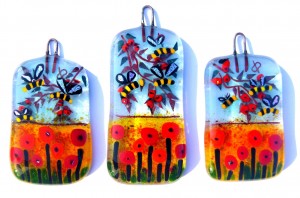 Glass decorations with poppy field, bees and apple branches